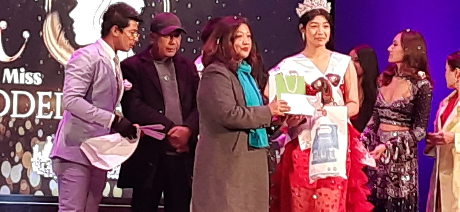 Insurance awareness session at British college with Fashion event participants.